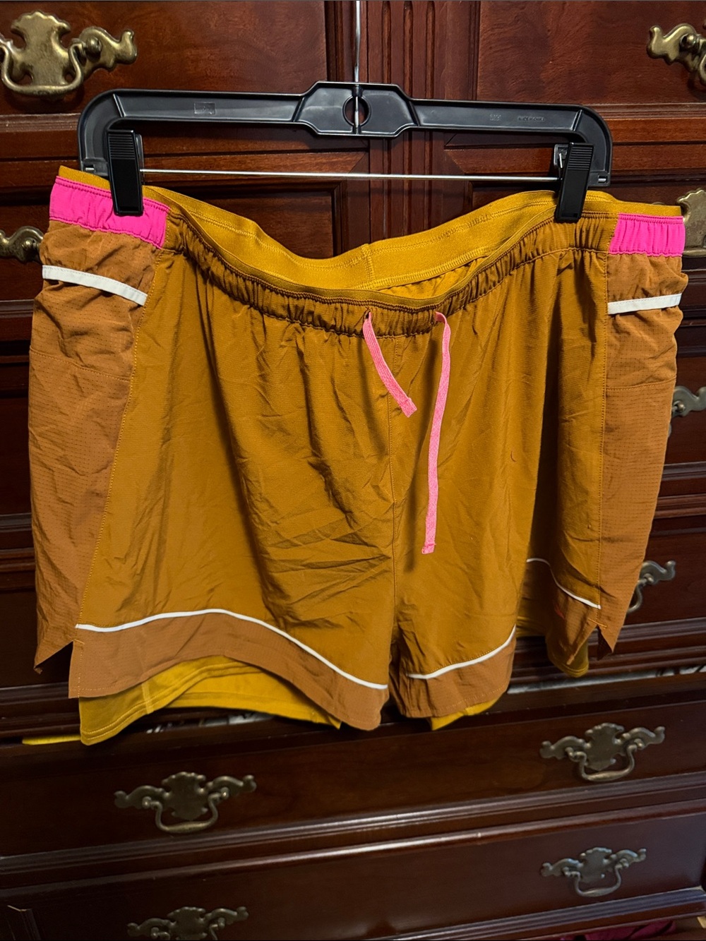Brooks Mustard Yellow Athletic Shorts with Pink Accents